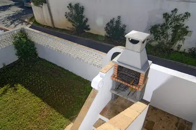 a white fence with a machine on top of it at 602 Casa Alma Mar in Luz