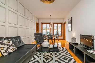 a living room with a couch and a table at Apartamento Centralis by Homie in Funchal