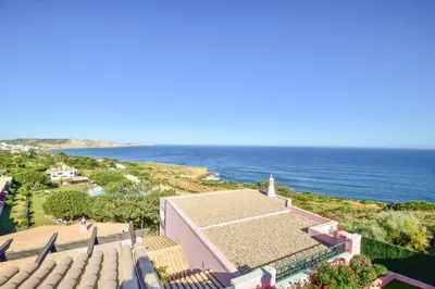 an aerial view of a building and the ocean at Apartment Luz Views by MOJE Holiday in Luz