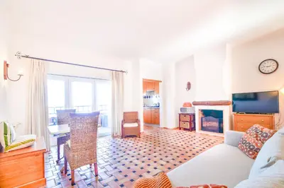 a living room with a couch and a table at Apartment Luz Views by MOJE Holiday in Luz
