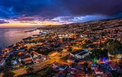 an aerial view of a city at night at CASA DO MIRADOURO 5 by Heart of Funchal in Funchal