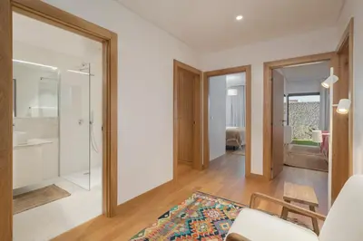 a living room with a glass shower and a couch at CASA DO MIRADOURO 7 by Heart of Funchal in Funchal