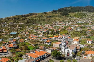 an aerial view of a town on a hill at OurMadeira - Arco Sun in Arco da Calheta