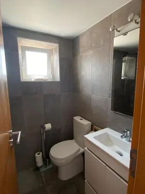 a bathroom with a toilet and a sink at Sunny Aljezur da Viana, (Aljezur, Costa Vicentina) in Aljezur