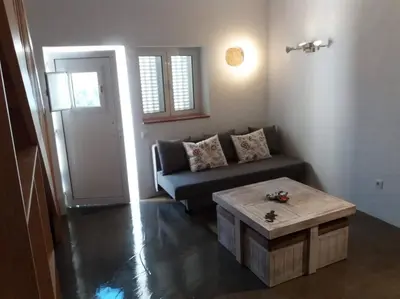 a living room with a couch and a coffee table at Sunny Aljezur da Viana, (Aljezur, Costa Vicentina) in Aljezur