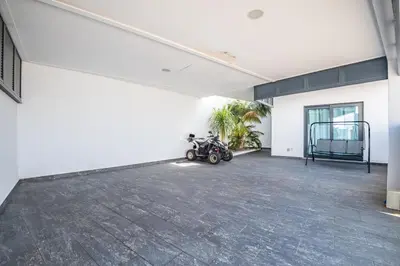 a motorcycle parked in the middle of a large room at Uptown Sea View by Homie in Funchal