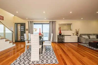 a living room with a table and a couch at Uptown Sea View by Homie in Funchal