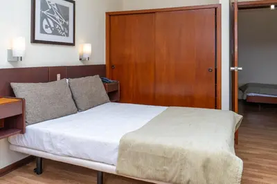 a bathroom with a shower and a white sink at Flag Hotel Madeira - Ribeira Brava in Ribeira Brava