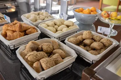 a counter with four food blenders filled with oats at Flag Hotel Madeira - Ribeira Brava in Ribeira Brava