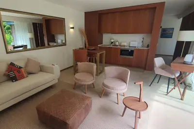a living room with a couch and chairs and a table at Terrabona Nature & Vineyards in Boaventura