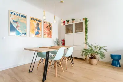 a dining room with a table and chairs at Clifftop Nest Arrifana by Lisbeyond in Aljezur