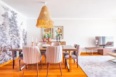 a dining room with a table and chairs at Apartamento Vale Verde by Homie in Funchal