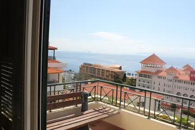 a view of the ocean from a balcony at Penthouse Canico Mar in Caniço