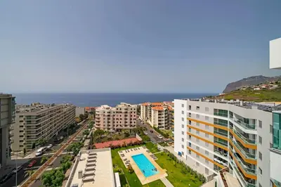 an aerial view of a city with buildings and the ocean at Formosa Ocean View - 142109/AL in Funchal