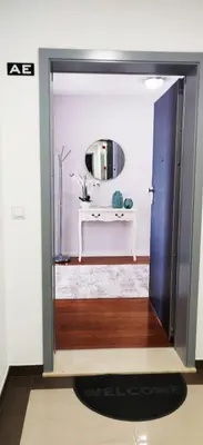 a room with a mirror and a white table at Formosa Ocean View - 142109/AL in Funchal