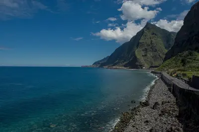 a view of the ocean from the side of a mountain at Pereira Place - Cottage in São Vicente