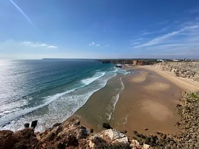 a view of a beach with rocks and the ocean at Casa com terraço e piscina Sagres in Sagres