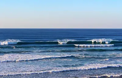 a group of breaking waves in the ocean at Blue Room in Pedralva