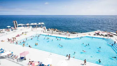 a group of people in a swimming pool on a cruise ship at Lido Sol 318 in Funchal