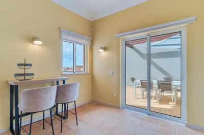 a hallway with a fireplace in a house at Villa Gasparini Palheiro Village by Holiday Rental Madeira in Funchal