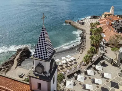 an aerial view of the pool at the resort at Dreams Madeira Resort Spa & Marina in Caniçal