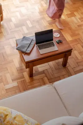 a laptop computer on a wooden table in a room at Matur I by An Island Apart in Água de Pena