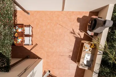 a view from above of a building with a balcony at H2Ome by An Island Apart in Porto Santo