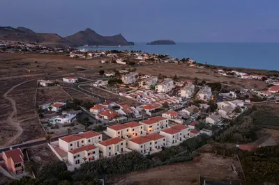 an aerial view of a town on a hill at H2Ome by An Island Apart in Porto Santo