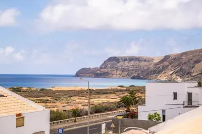 a view of the ocean from a building at Casa Anaim by Homie in Porto Santo