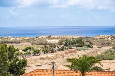 a view of the ocean from a house at Casa Anaim by Homie in Porto Santo