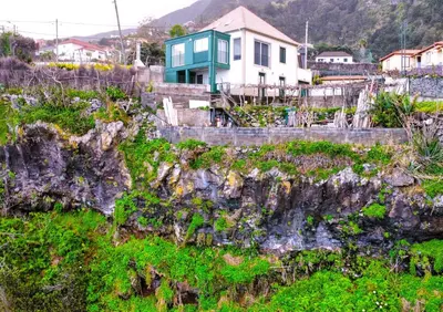 a house on top of a rocky cliff at Holiday`s House 