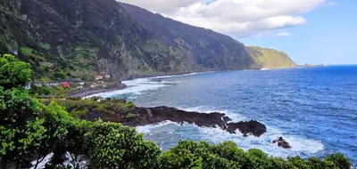 a view of a beach with the ocean at Holiday`s House 