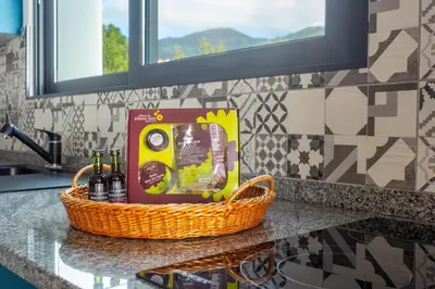 a basket sitting on top of a counter in a kitchen at Casa Teixeira by Atlantic Holiday in Venda do Atalhinho