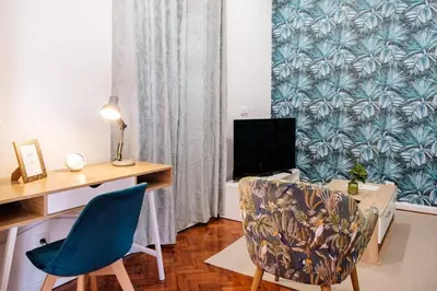 a room with a desk and a computer and a chair at GuestReady - Blissful Getaway in Funchal in Funchal