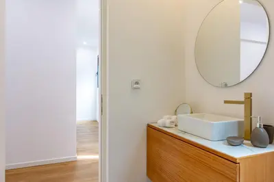a bathroom with a sink and a mirror at Villa Mármore in Funchal