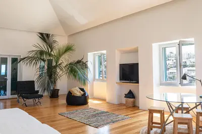 a screenshot of a website with a picture of a city at Casa Mar Adentro in Câmara de Lobos