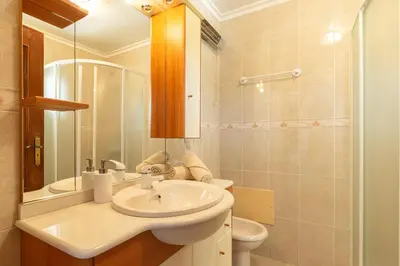 a bathroom with a sink and a toilet at Noite´s House - Prazeres in Prazeres