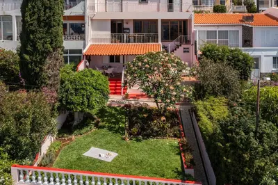 an aerial view of a house with a garden at Casa Frangipani by An Island Apart in Santa Cruz