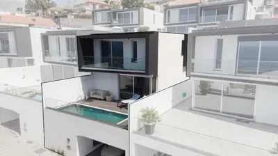 an aerial view of a white apartment building at Tiz house in Funchal