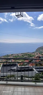 a view from a window of a train at ARTIST HOUSE Rooms With View And Shared Kitchen in Arco da Calheta