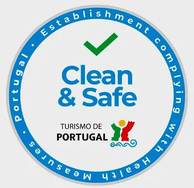 a blue clean and safe logo at ARTIST HOUSE Rooms With View And Shared Kitchen in Arco da Calheta
