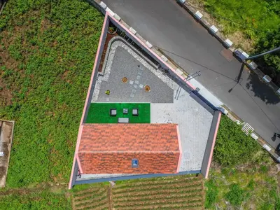 an overhead view of a building with a basketball court at Mountain Retreat by Homie in Porto Moniz