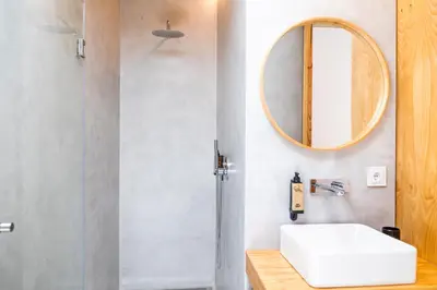 a bathroom with a white sink and a mirror at Casa Da Avó Clementina Nº 30 in Funchal