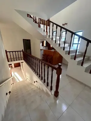 a staircase in a house with a stair case at Casa Carneirinho by Olá Madeira in Paul do Mar