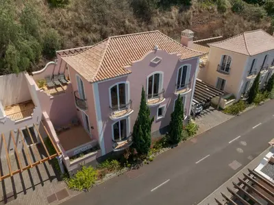 an overhead view of a house with a street at Balancal Apartments and Villas Palheiro Village by Holiday Rental Madeira in Funchal