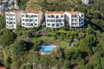 an aerial view of a villa with a resort at Tucha's Apartement in Funchal
