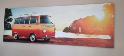 a picture of a van parked next to the ocean at Marear in Porto Santo