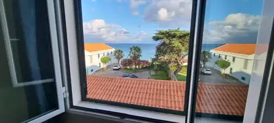 a view of the ocean from a window at Marear in Porto Santo