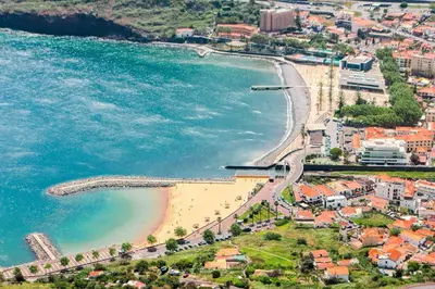 an aerial view of a beach and the ocean at The Great Pearl Ocean Views Near Beach & Airport in Machico