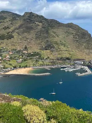 a view of a bay with boats in the water at The Great Pearl Ocean Views Near Beach & Airport in Machico